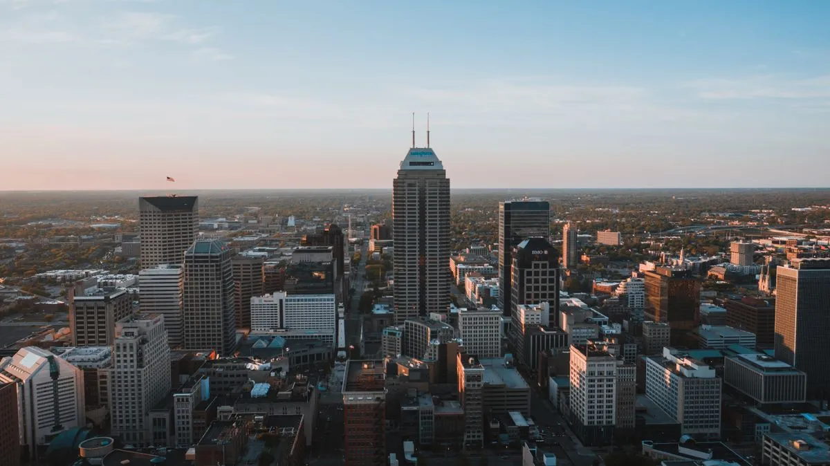 An aerial view of the downtown Indianapolis skyline at dusk